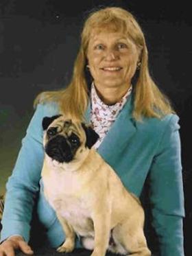 Owner holding pug