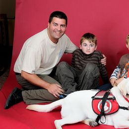 Golden Retriever and Labrador Retriever All Grown Up from Can Do Canines Assistance Dogs